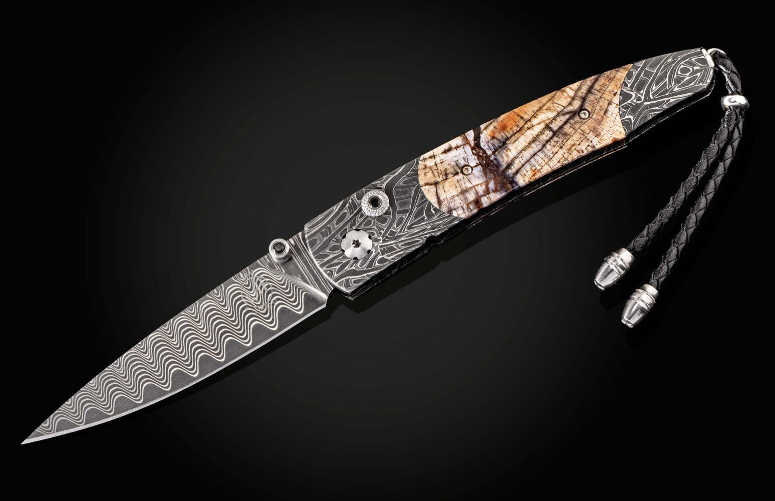 William Henry Pocketknife featuring etched damascus, fossil Mammoth tusk, and 'wave' damascus blade B10 DARK RING