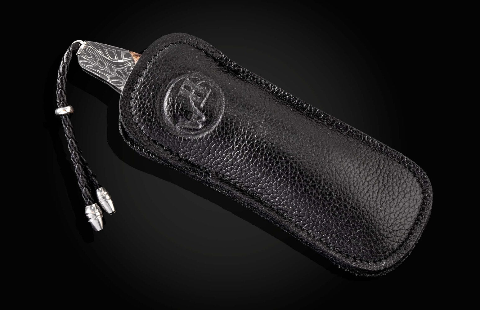William Henry Pocketknife featuring etched damascus, fossil Mammoth tusk, and 'wave' damascus blade B10 DARK RING