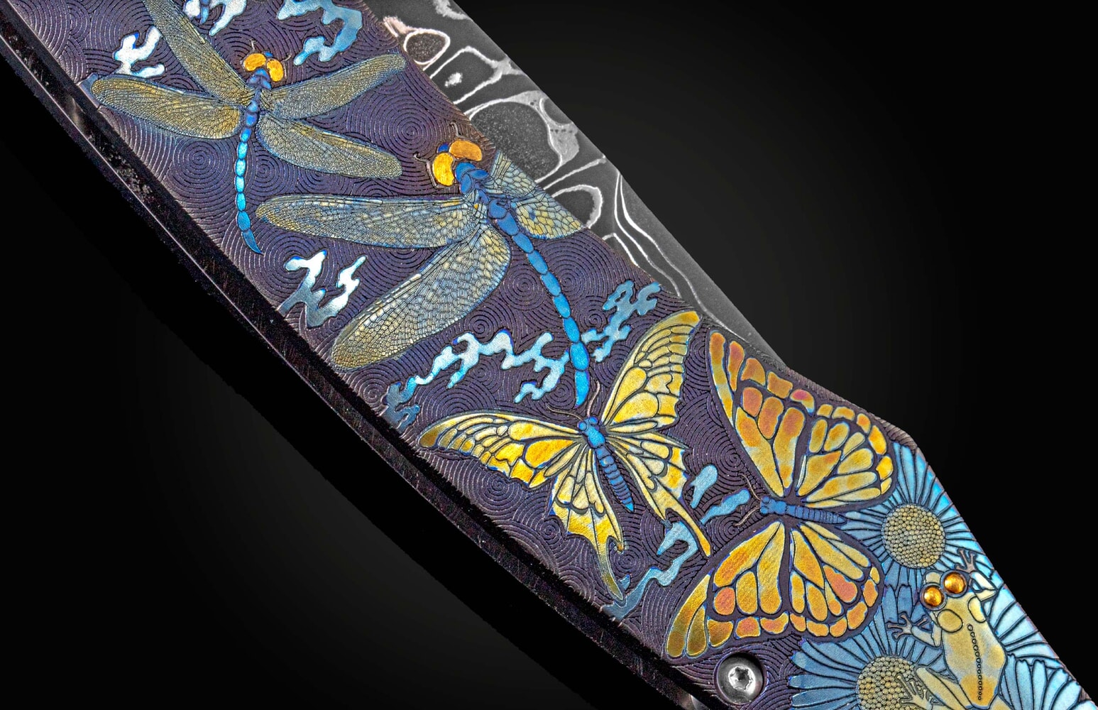 William Henry Hand and laser engraved folding knife with hand-forged damascus B12 MARIPOSA