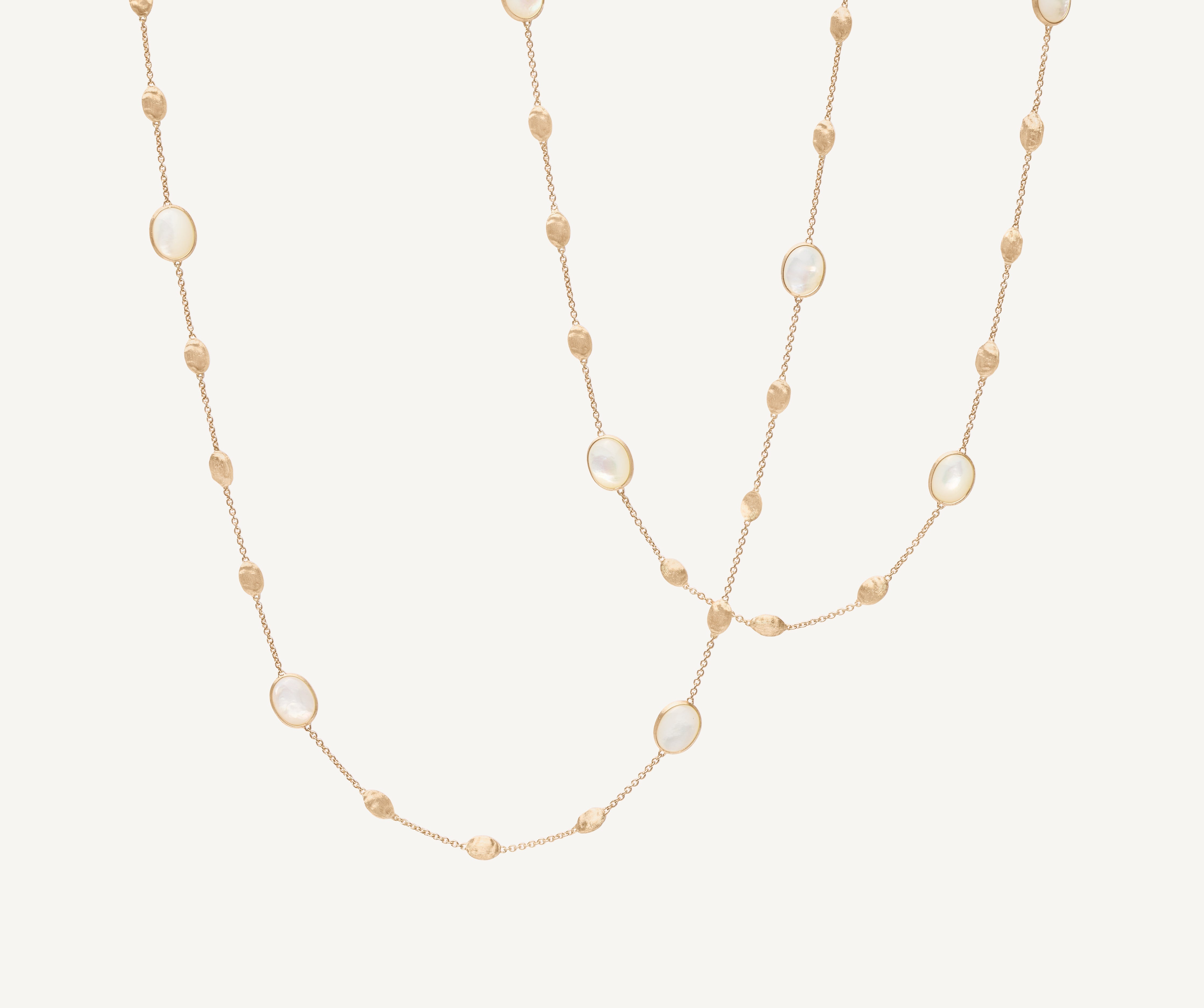 18kt yellow gold long necklace with small ovals, mother-of-pearl, and diamonds