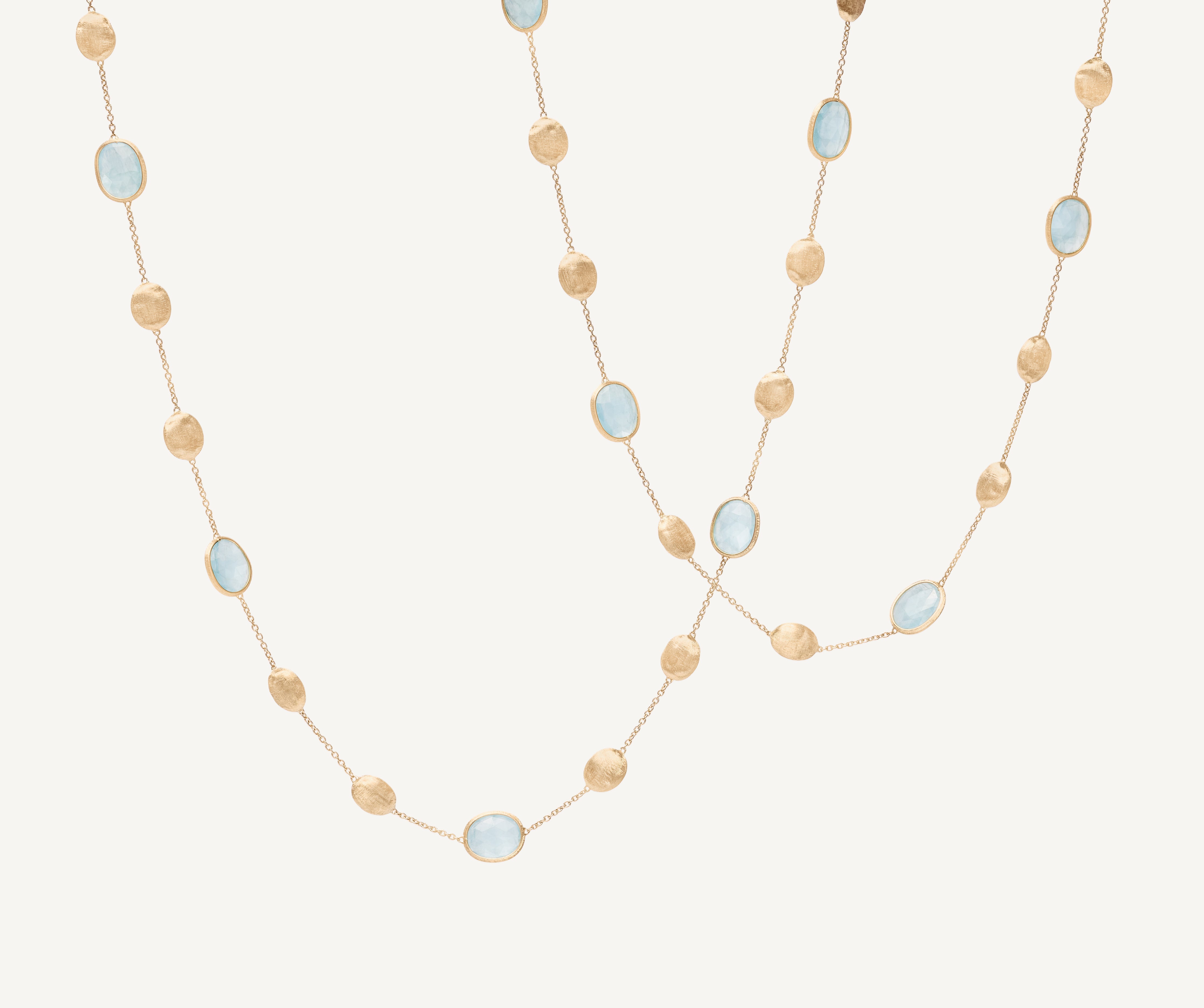 18kt yellow gold long necklace with aquamarines and diamonds