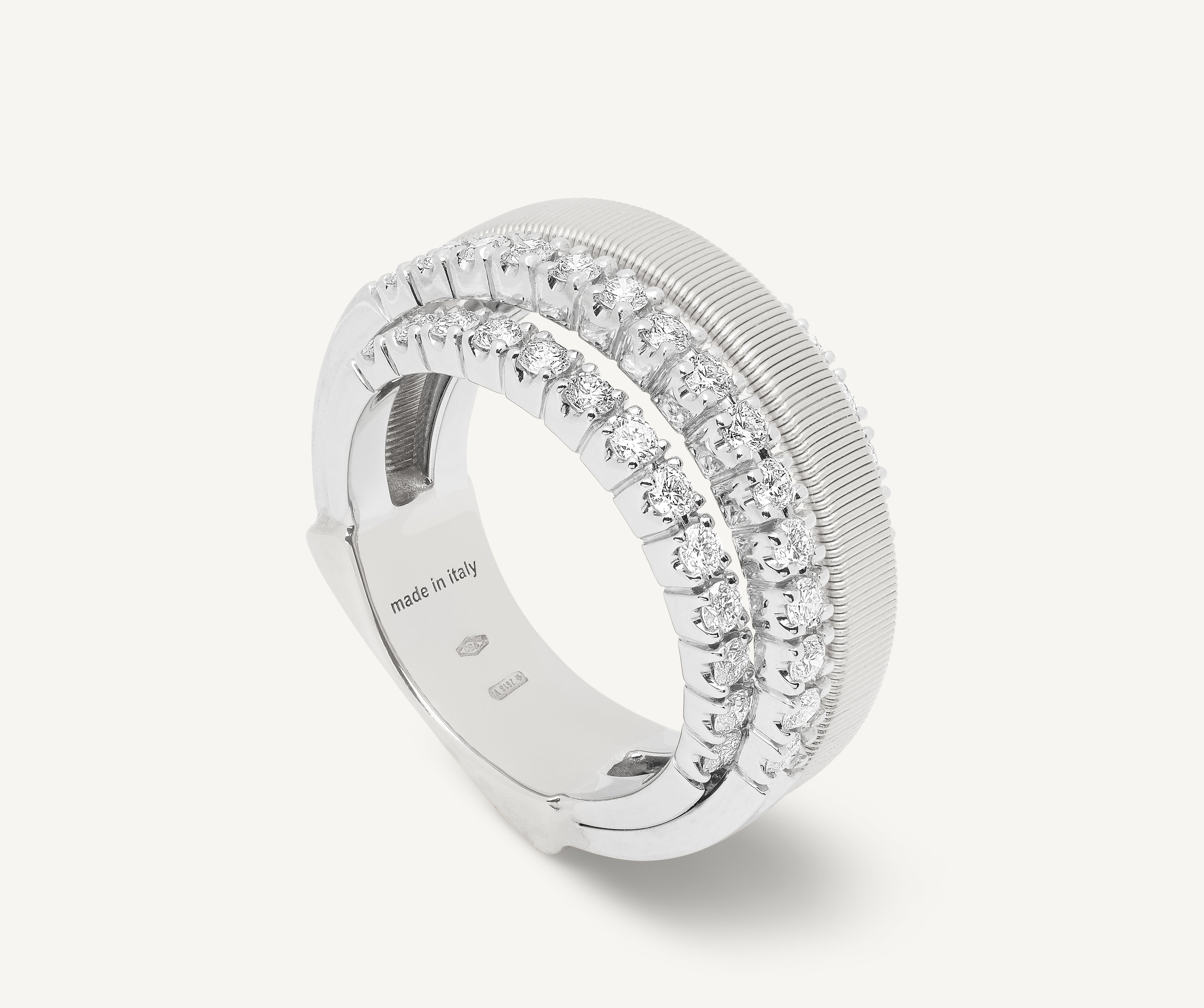 18kt white gold 4-strand coil ring with diamond 3 pav bands