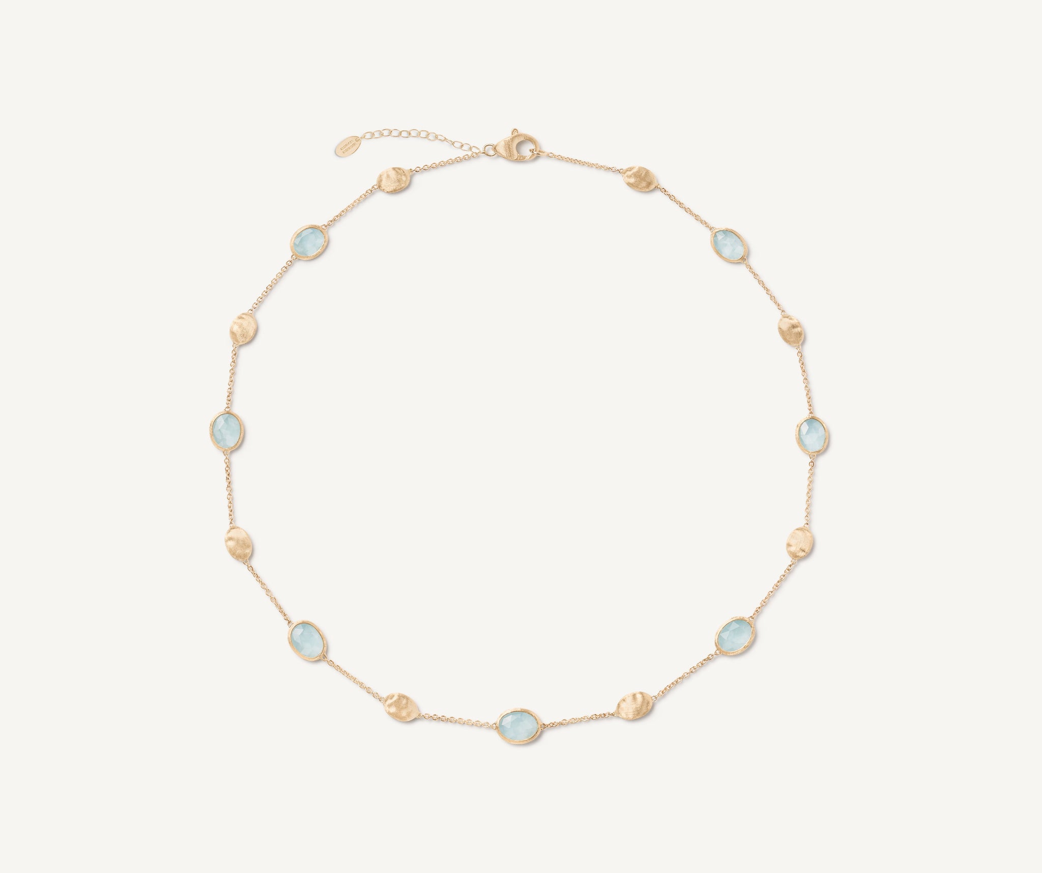 18kt yellow gold necklace with oval elements and aquamarine