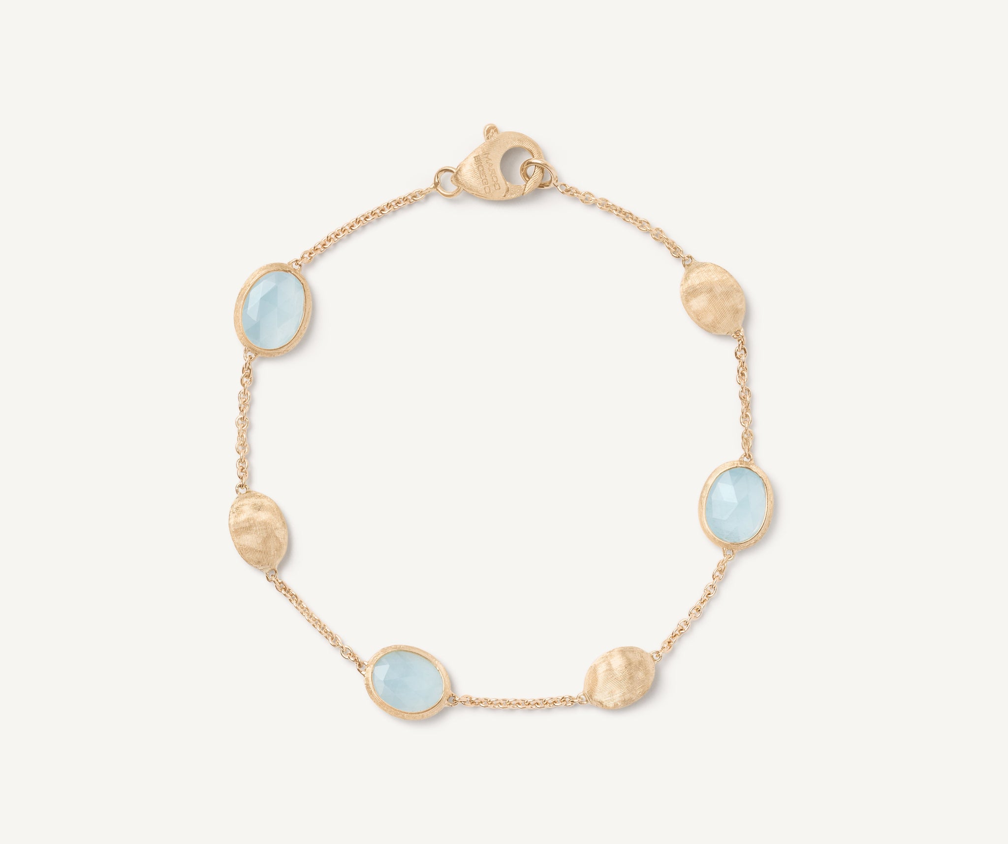 18kt yellow gold bracelet with oval elements and aquamarine