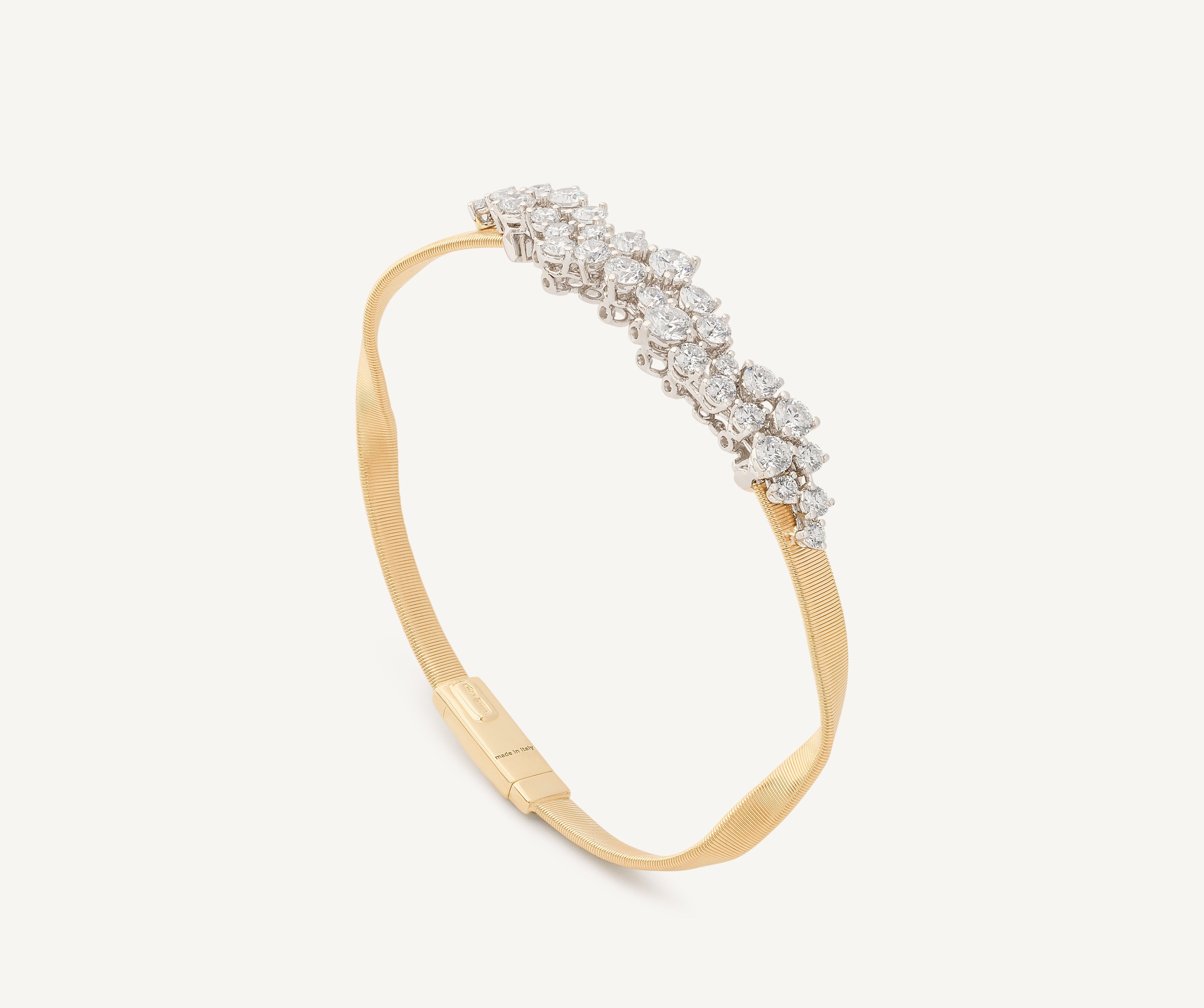 18kt yellow gold bracelet with graduated diamond cluster