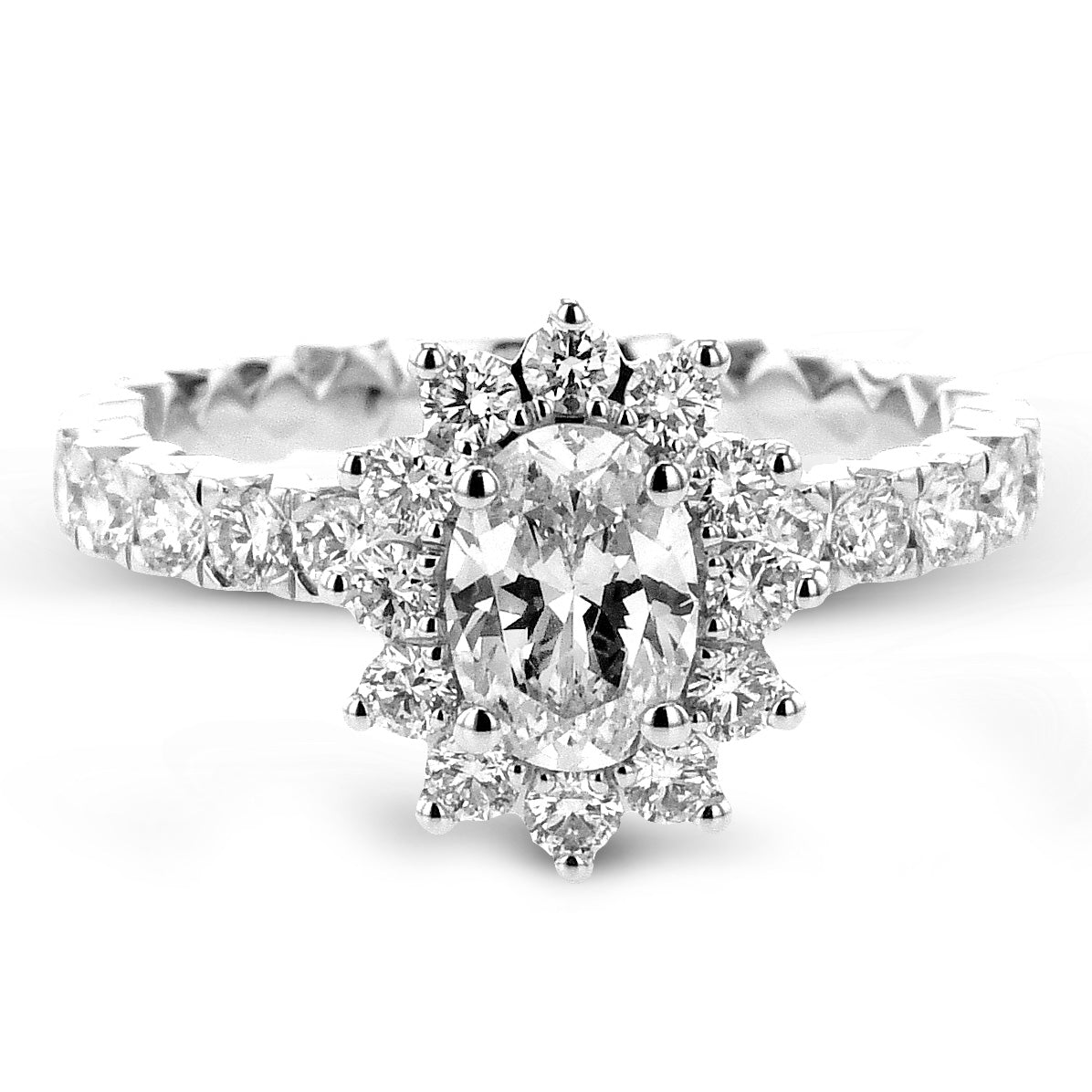 oval-cut-flower-halo-engagement-ring-in-18k-gold-with-diamonds