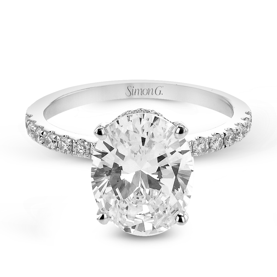 oval-cut-hidden-halo-engagement-ring-in-18k-gold-with-diamonds