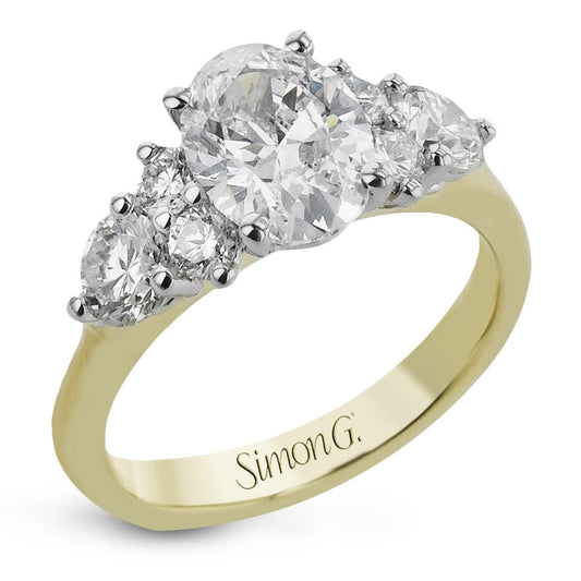 oval-cut-three-stone-engagement-ring-in-18k-gold-with-diamonds