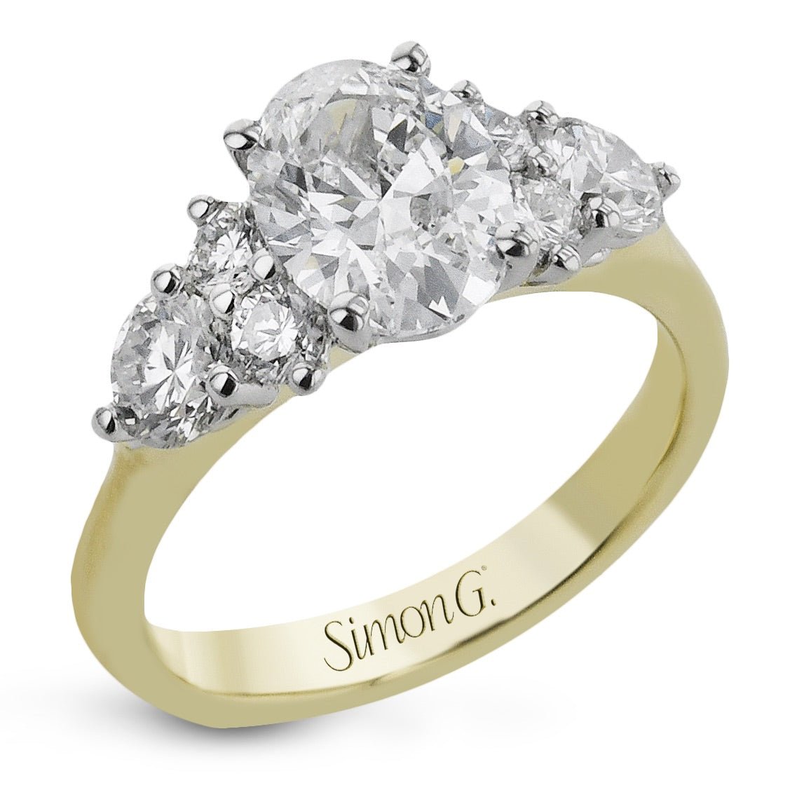 oval-cut-three-stone-engagement-ring-in-18k-gold-with-diamonds