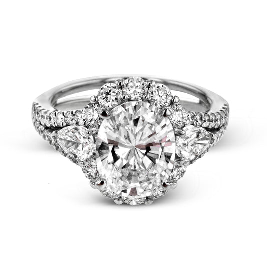 oval-cut-three-stone-halo-engagement-ring-in-18k-gold-with-diamonds
