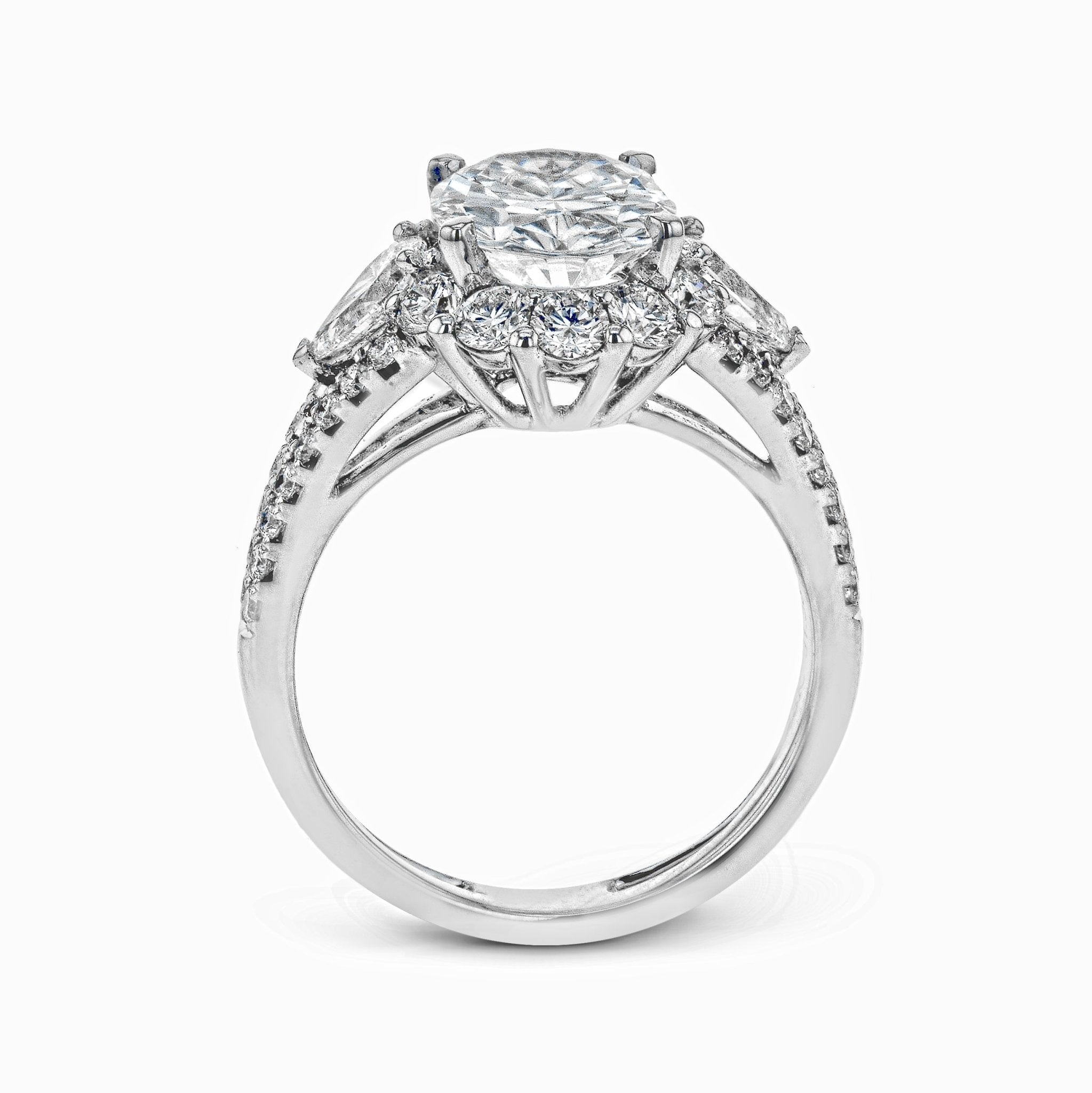 oval-cut-three-stone-halo-engagement-ring-in-18k-gold-with-diamonds