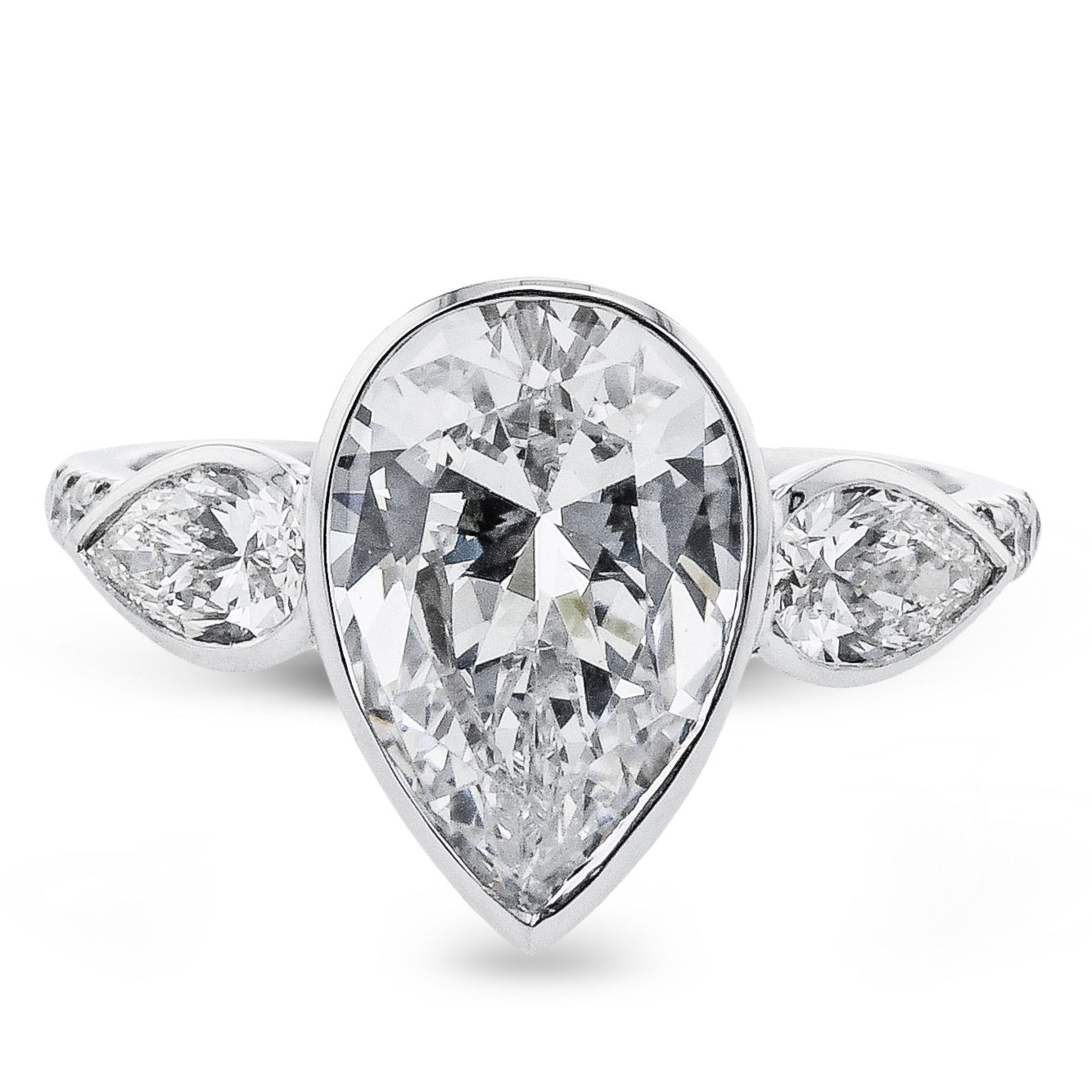 pear-cut-three-stone-engagement-ring-in-18k-gold-with-diamonds