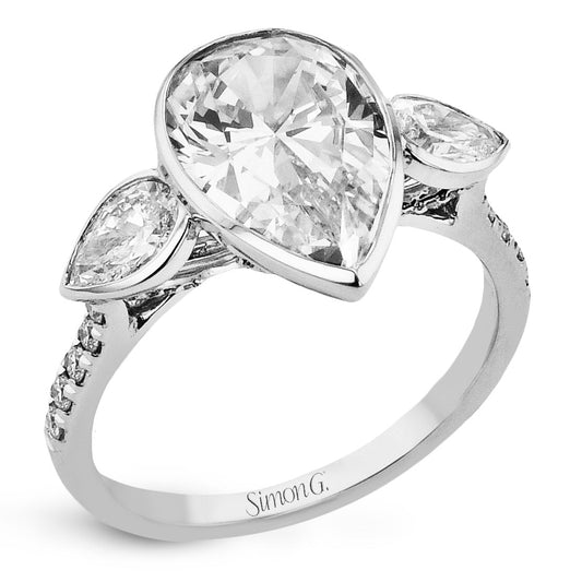 pear-cut-three-stone-engagement-ring-in-18k-gold-with-diamonds