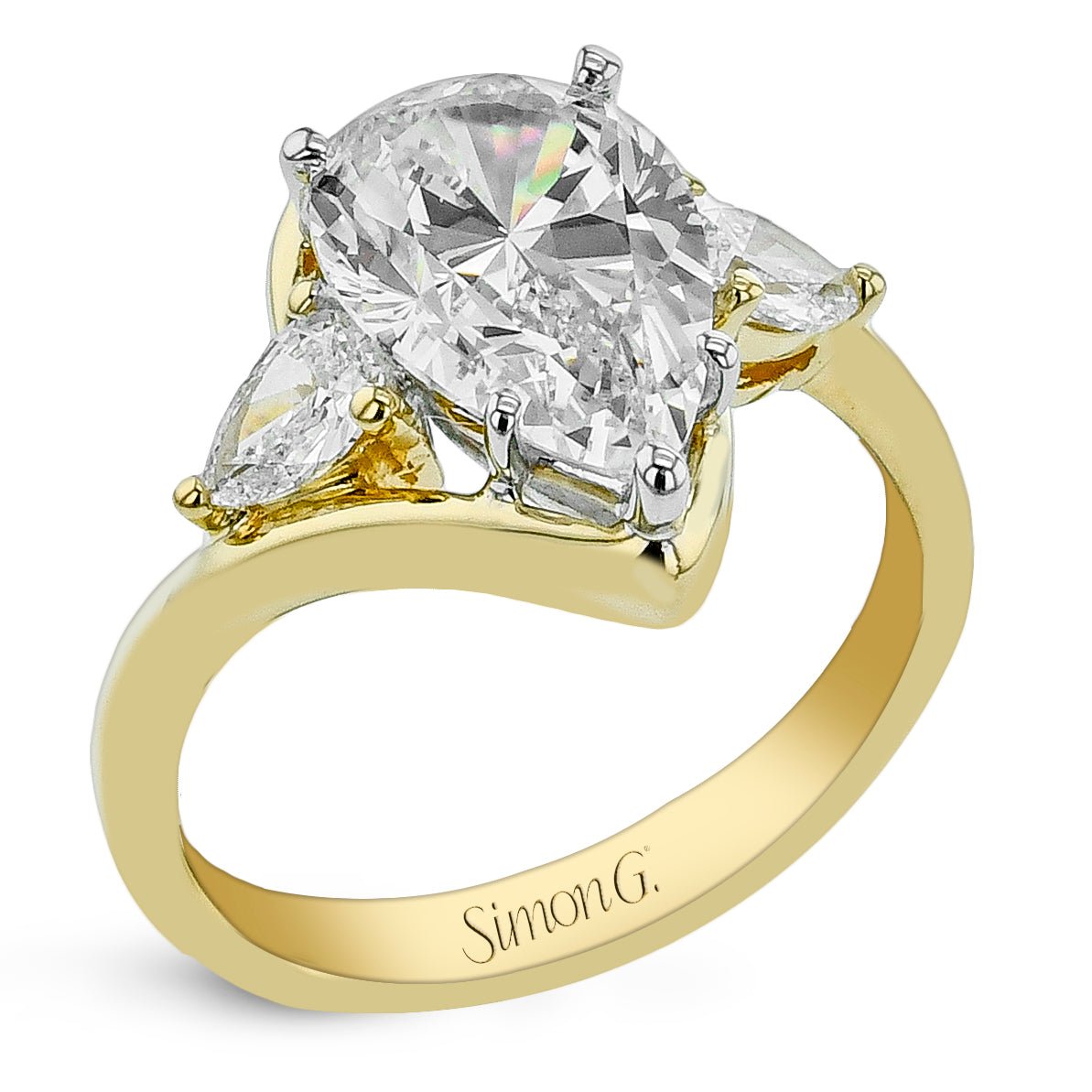 pear-cut-three-stone-engagement-ring-in-18k-gold-with-diamonds