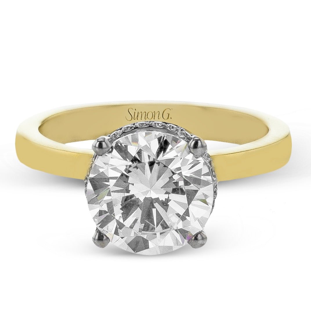 round-cut-hidden-halo-engagement-ring-in-18k-gold-with-diamonds