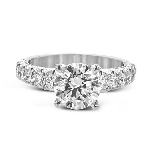 round-cut-engagement-ring-in-18k-gold-with-diamonds