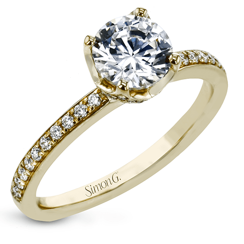 round-cut-engagement-ring-in-18k-gold-with-diamonds