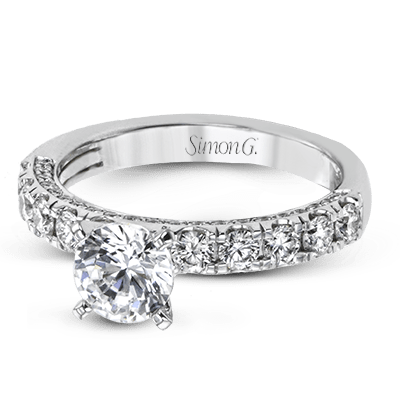 round-cut-engagement-ring-in-18k-gold-with-diamonds