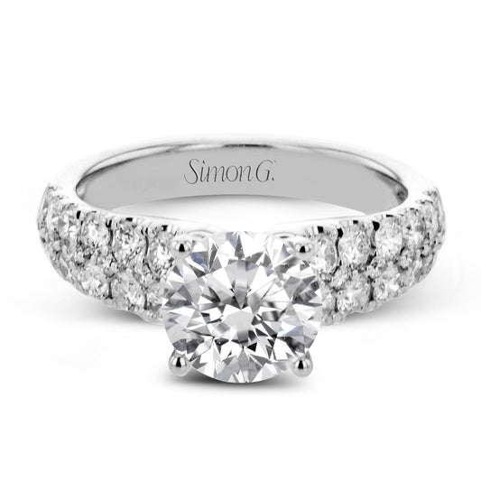 round-cut-engagement-ring-in-18k-gold-with-diamonds