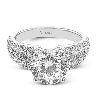 round-cut-engagement-ring-in-18k-gold-with-diamonds
