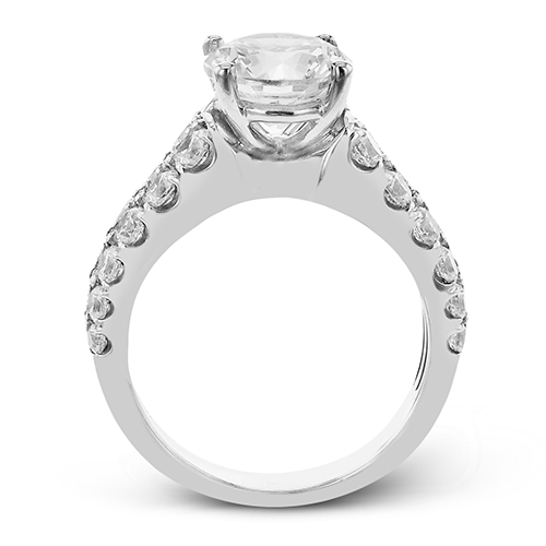 round-cut-engagement-ring-in-18k-gold-with-diamonds