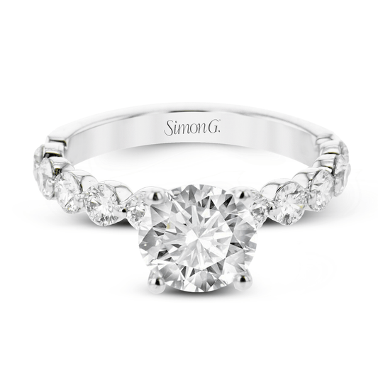 round-cut-engagement-ring-in-18k-gold-with-diamonds
