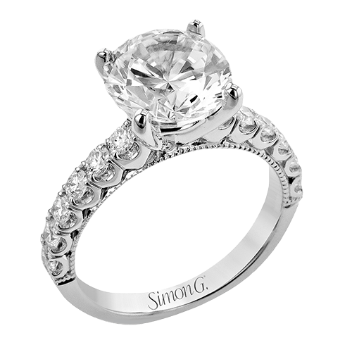 round-cut-engagement-ring-in-18k-gold-with-diamonds
