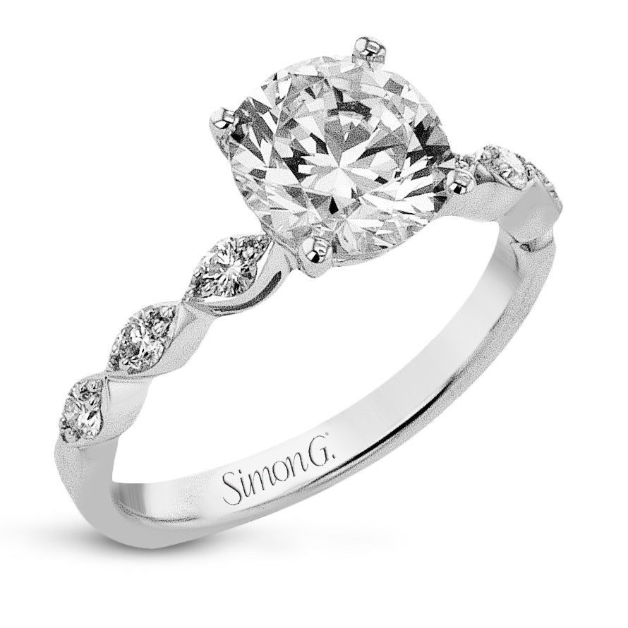 round-cut-engagement-ring-in-18k-gold-with-diamonds