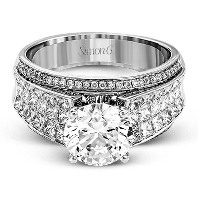 round-cut-engagement-ring-in-18k-gold-with-diamonds