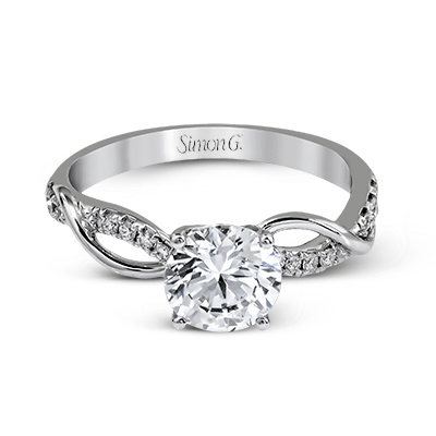 round-cut-engagement-ring-in-18k-gold-with-diamonds