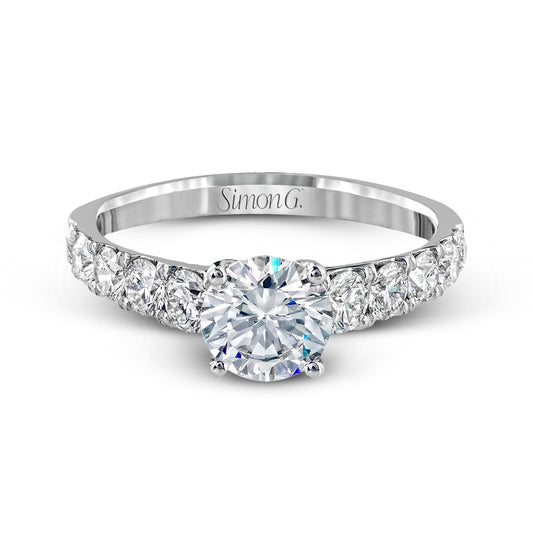 round-cut-engagement-ring-in-18k-gold-with-diamonds