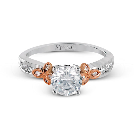 round-cut-engagement-ring-in-18k-gold-with-diamonds