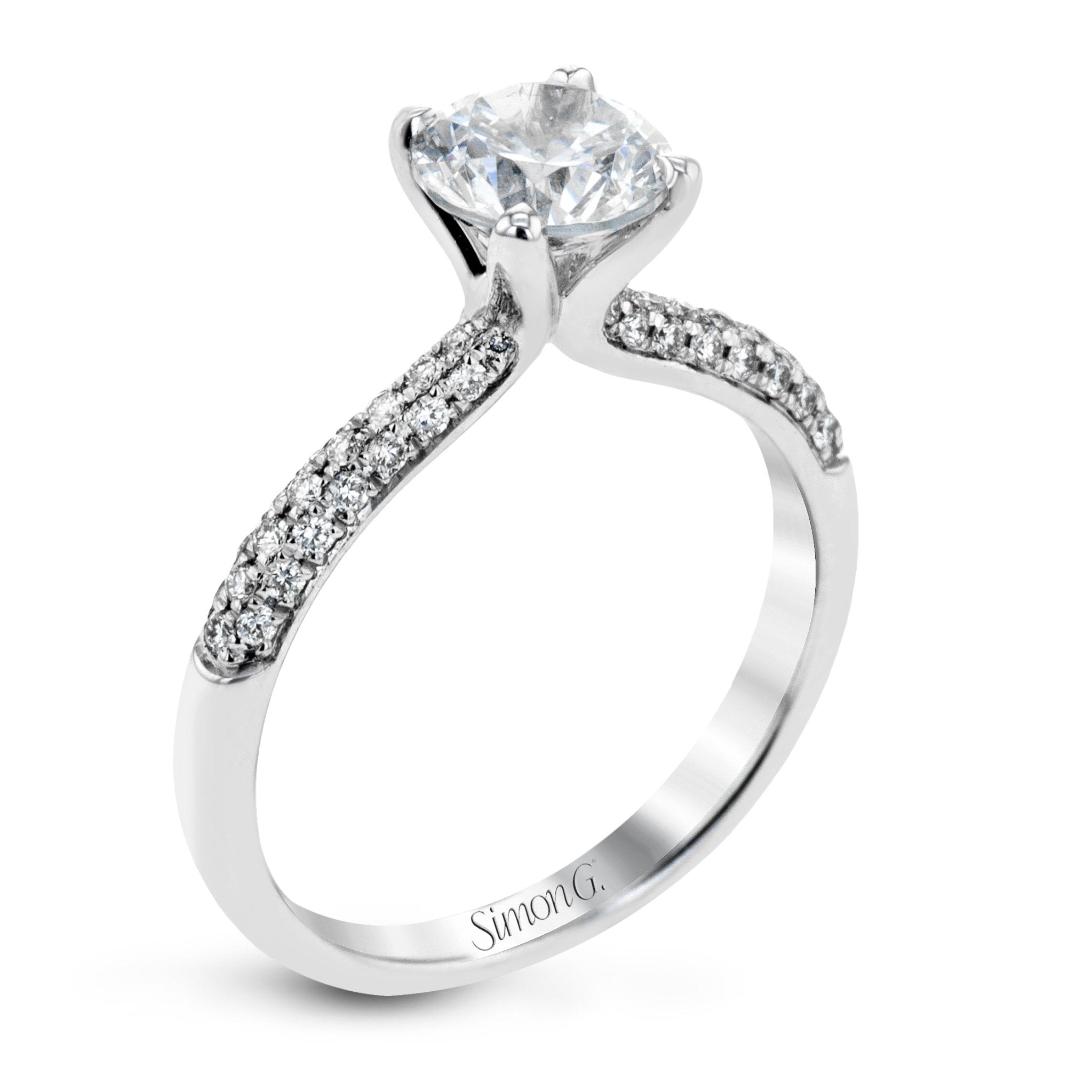 round-cut-engagement-ring-in-platinum-with-diamonds