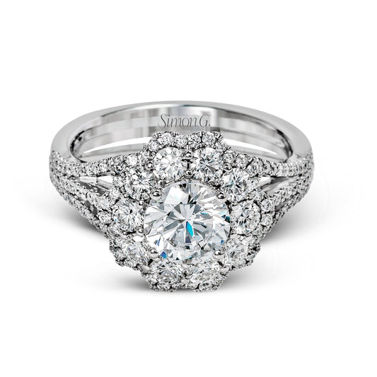 round-cut-halo-engagement-ring-in-18k-gold-with-diamonds