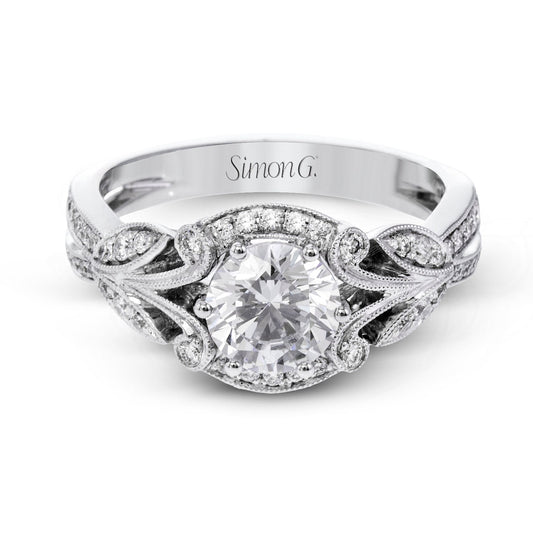 round-cut-halo-engagement-ring-in-18k-gold-with-diamonds