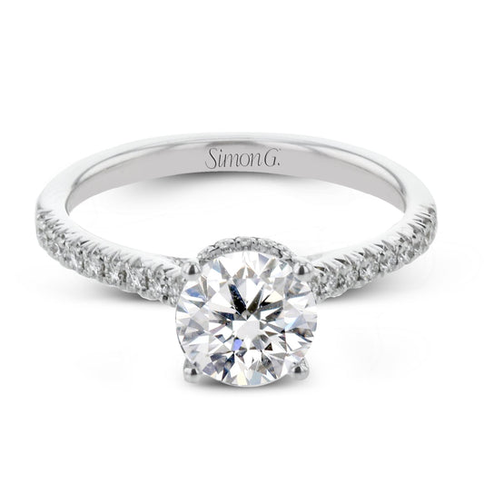 round-cut-hidden-halo-engagement-ring-in-18k-gold-with-diamonds