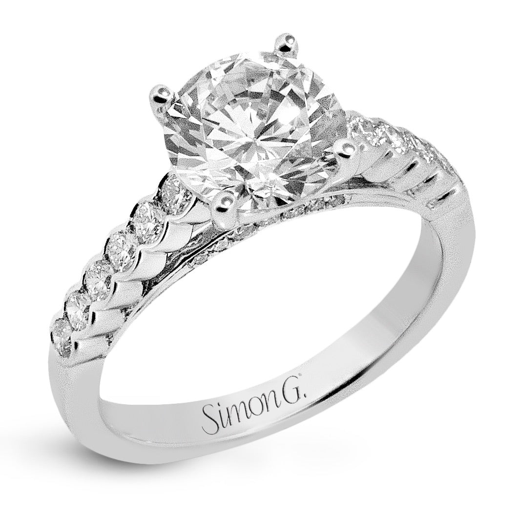 round-cut-micro-bezel-engagement-ring-in-18k-gold-with-diamonds