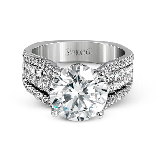round-cut-simon-set-engagement-ring-in-18k-gold-with-diamonds