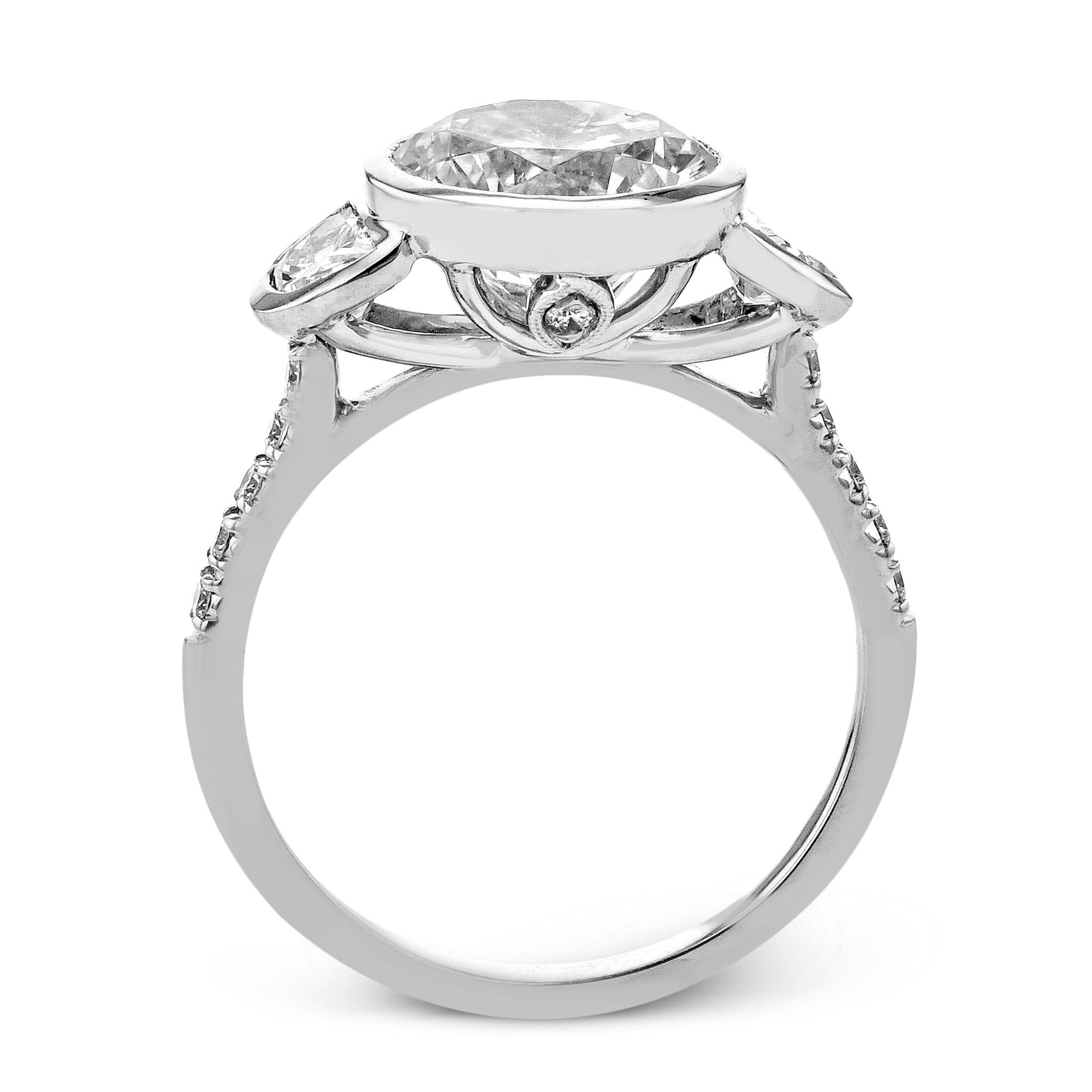 round-cut-three-stone-engagement-ring-in-18k-gold-with-diamonds